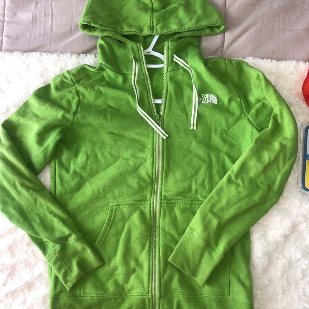Green North Face running jacket